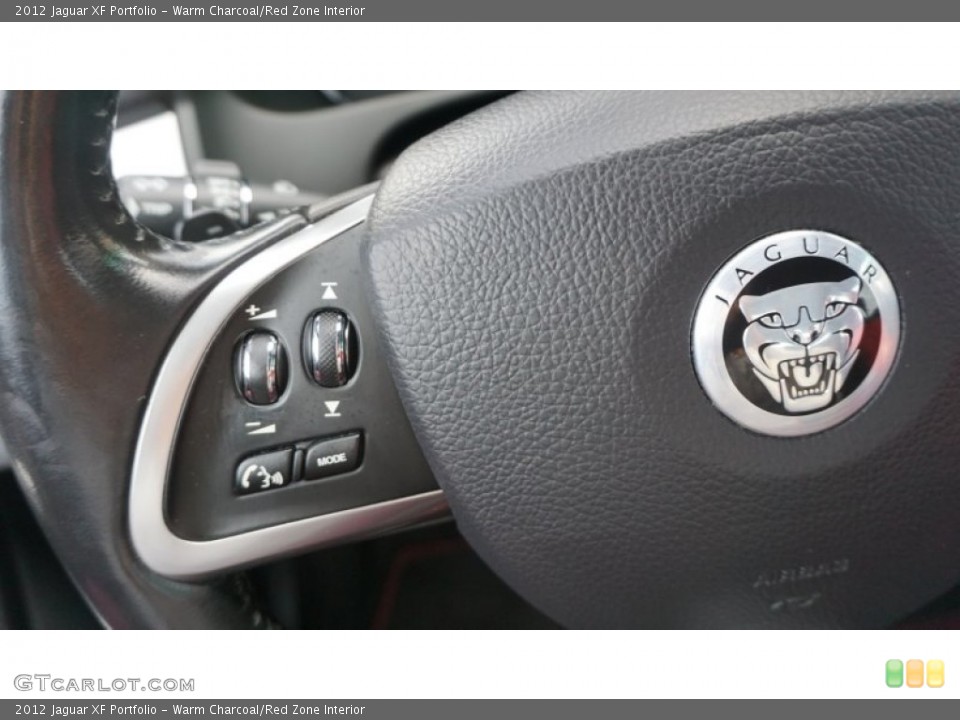 Warm Charcoal/Red Zone Interior Controls for the 2012 Jaguar XF Portfolio #106329362