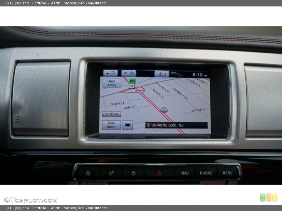 Warm Charcoal/Red Zone Interior Navigation for the 2012 Jaguar XF Portfolio #106329422