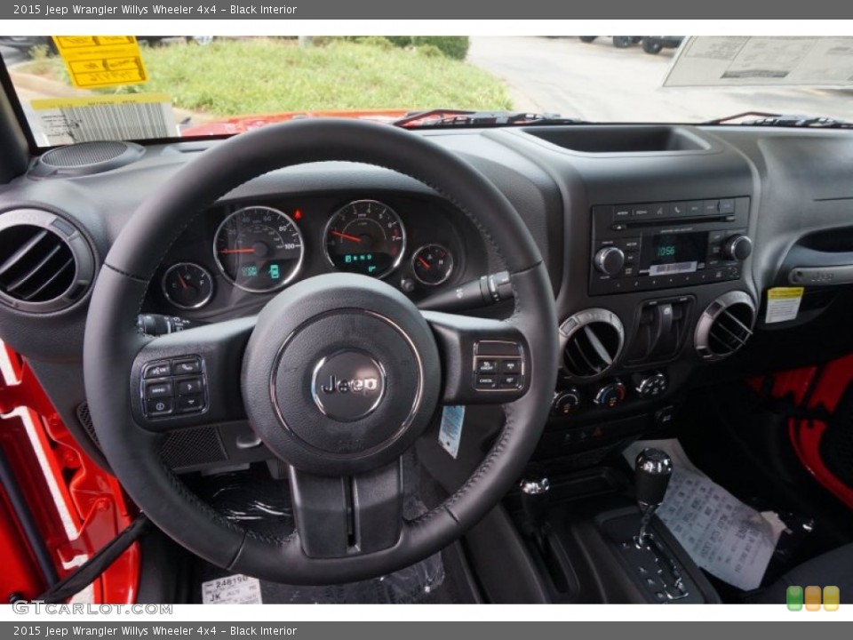 Black Interior Dashboard for the 2015 Jeep Wrangler Willys Wheeler 4x4 #106460923