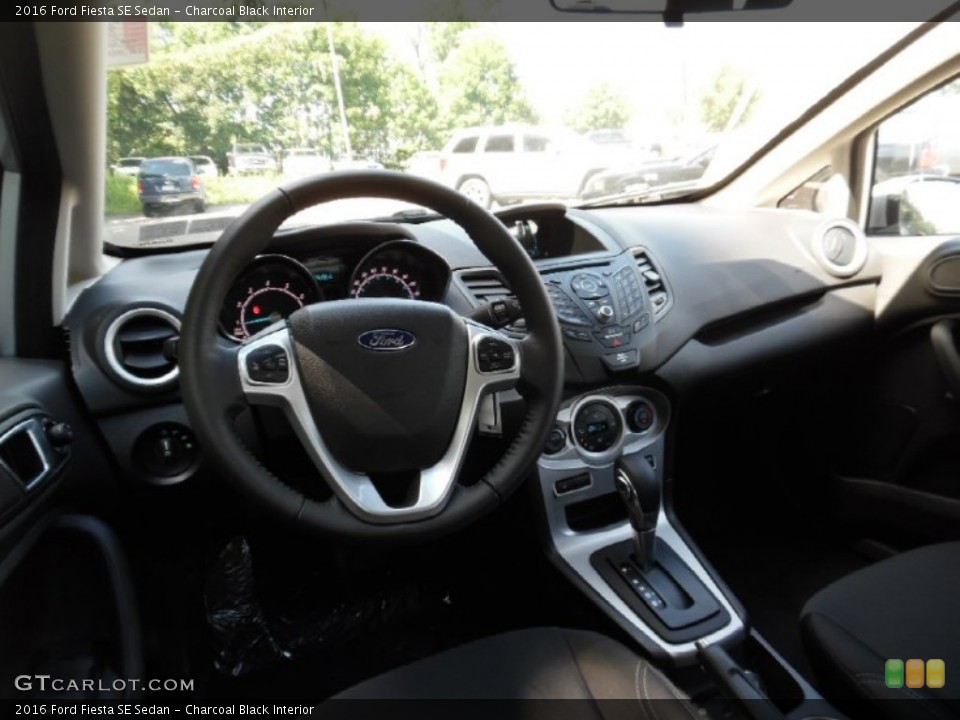 Charcoal Black Interior Dashboard for the 2016 Ford Fiesta SE Sedan #106548025