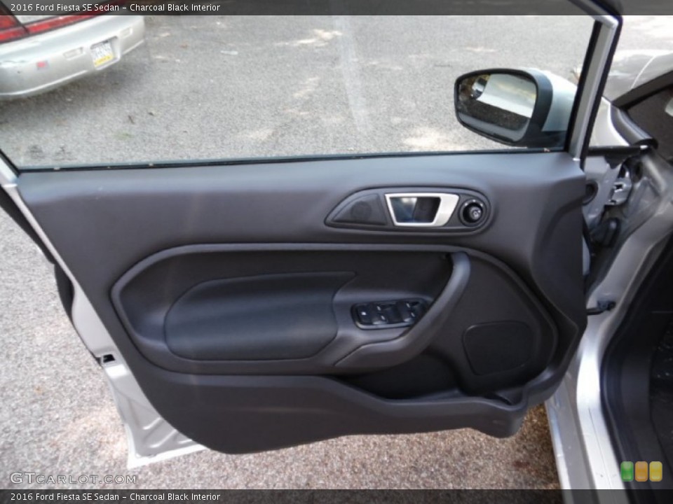 Charcoal Black Interior Door Panel for the 2016 Ford Fiesta SE Sedan #106548040
