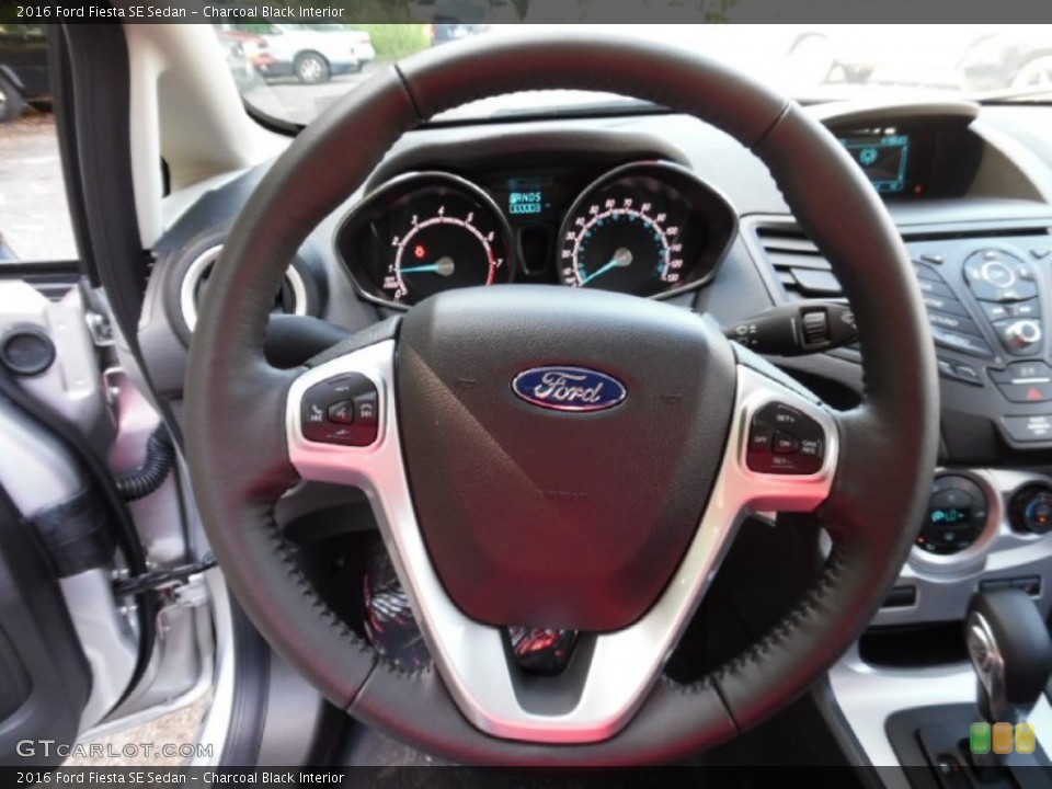 Charcoal Black Interior Steering Wheel for the 2016 Ford Fiesta SE Sedan #106548079