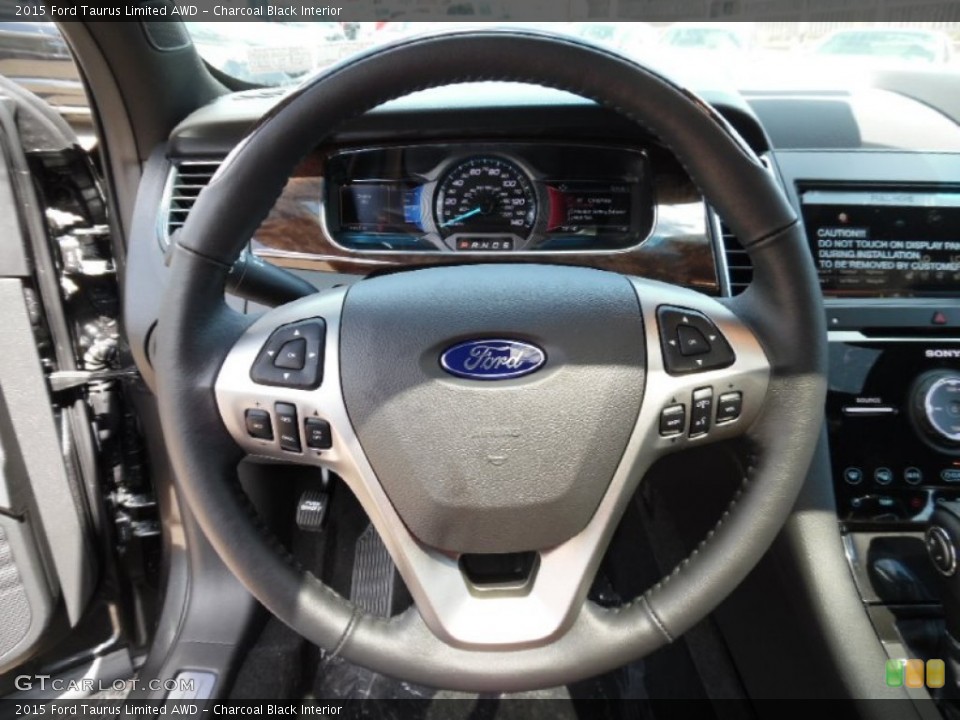 Charcoal Black Interior Steering Wheel for the 2015 Ford Taurus Limited AWD #106550083