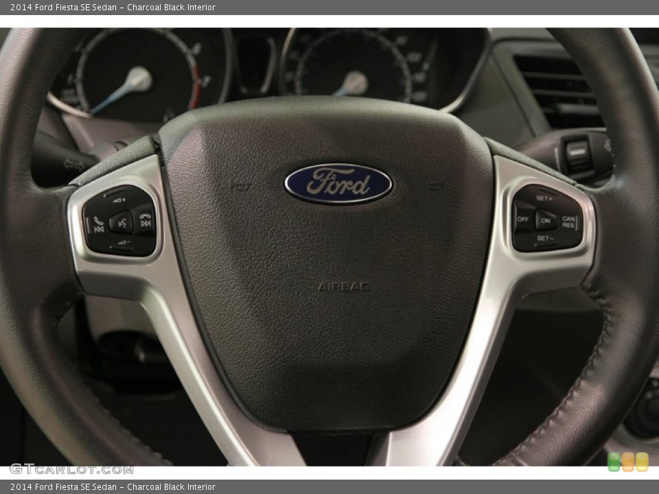 Charcoal Black Interior Steering Wheel for the 2014 Ford Fiesta SE Sedan #106631262