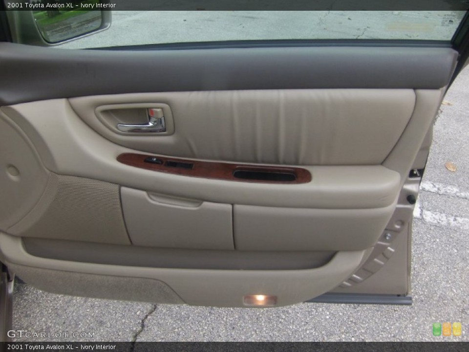 Ivory Interior Door Panel for the 2001 Toyota Avalon XL #106715359