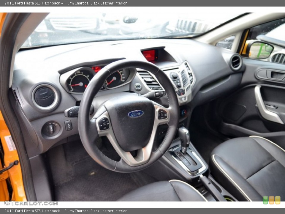 Plum/Charcoal Black Leather Interior Photo for the 2011 Ford Fiesta SES Hatchback #106774997