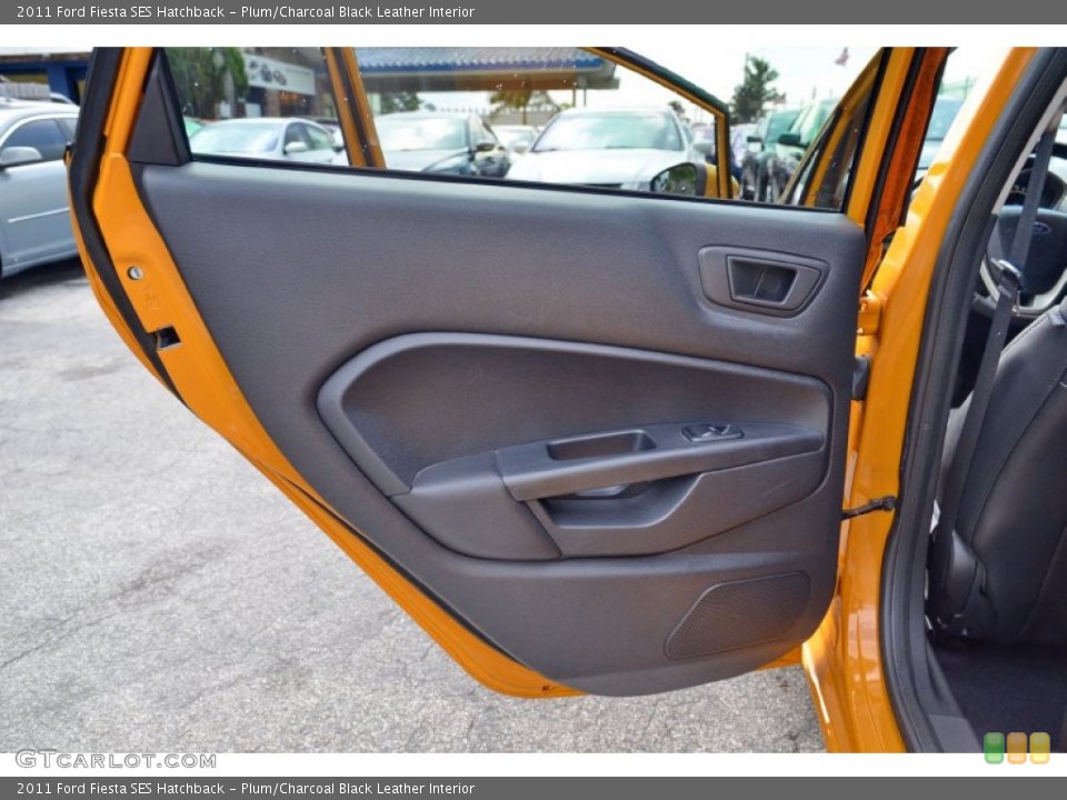 Plum/Charcoal Black Leather Interior Door Panel for the 2011 Ford Fiesta SES Hatchback #106775018