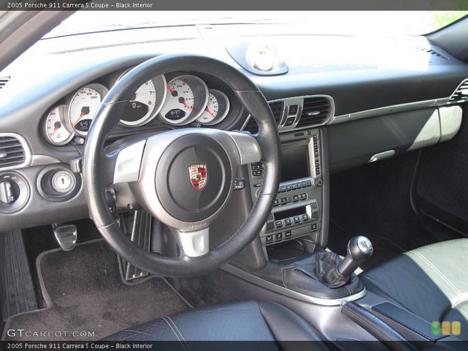 Black Interior Dashboard for the 2005 Porsche 911 Carrera S Coupe #106996624