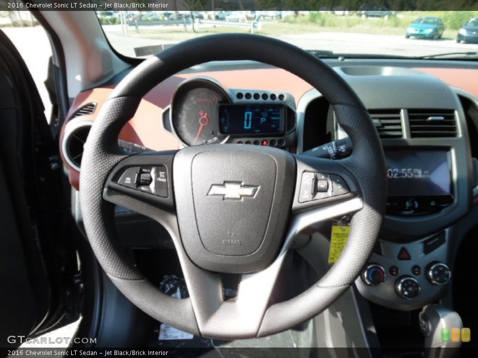 Jet Black/Brick Interior Steering Wheel for the 2016 Chevrolet Sonic LT Sedan #107002189