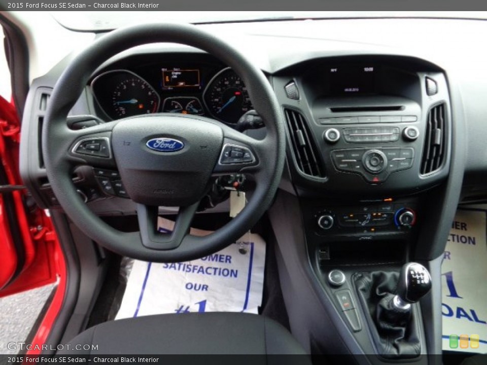 Charcoal Black Interior Dashboard for the 2015 Ford Focus SE Sedan #107336488