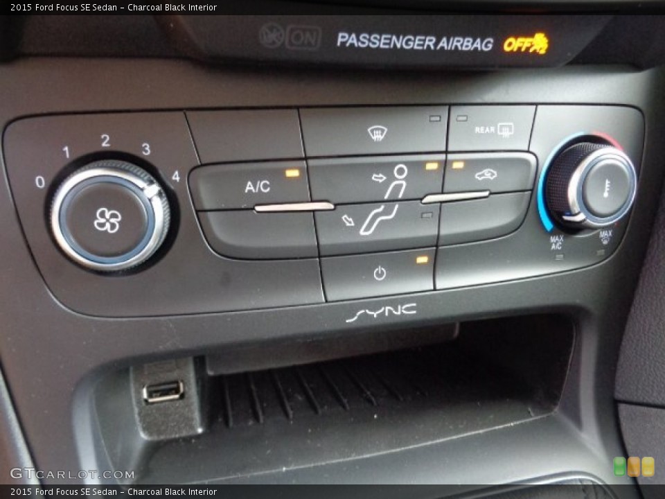 Charcoal Black Interior Controls for the 2015 Ford Focus SE Sedan #107336516