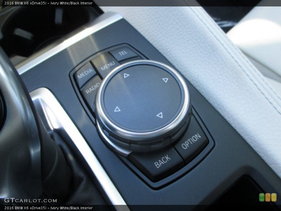 Ivory White/Black Interior Controls for the 2016 BMW X6 xDrive35i #107387303