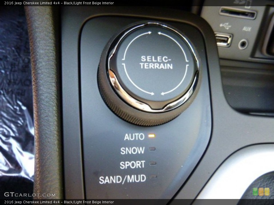 Black/Light Frost Beige Interior Controls for the 2016 Jeep Cherokee Limited 4x4 #107417414