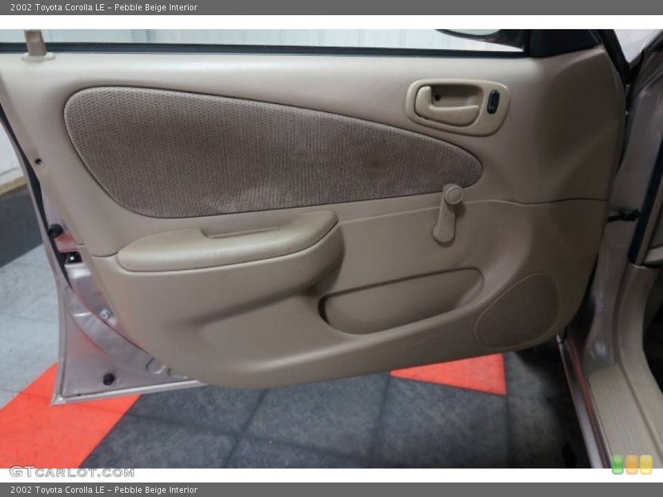 Pebble Beige Interior Door Panel for the 2002 Toyota Corolla LE #107425943