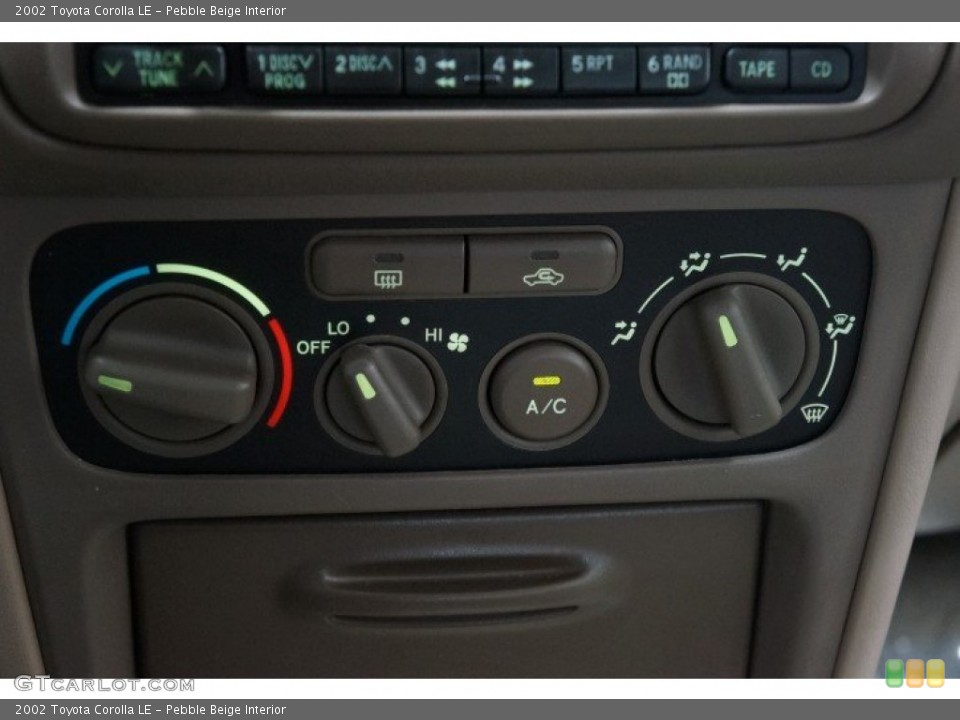 Pebble Beige Interior Controls for the 2002 Toyota Corolla LE #107426141