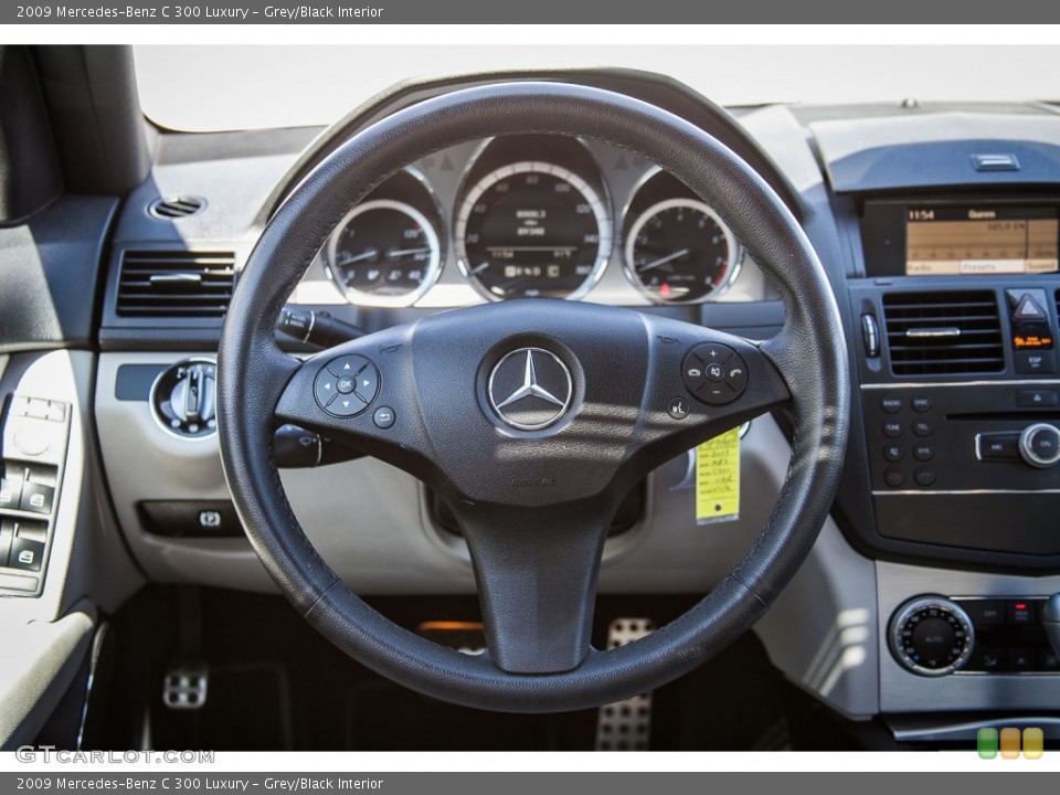 Grey/Black Interior Steering Wheel for the 2009 Mercedes-Benz C 300 Luxury #107453848