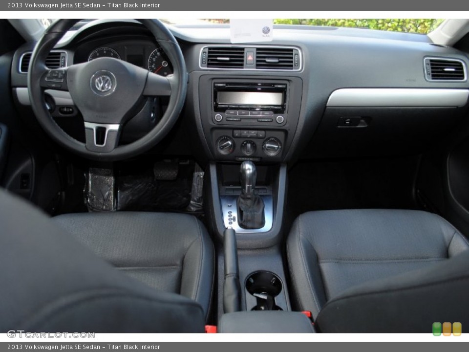 Titan Black Interior Dashboard for the 2013 Volkswagen Jetta SE Sedan #107458684