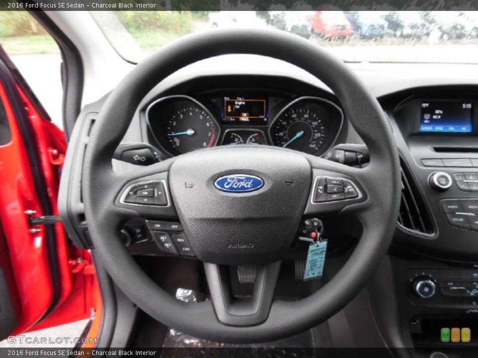 Charcoal Black Interior Steering Wheel for the 2016 Ford Focus SE Sedan #107517873