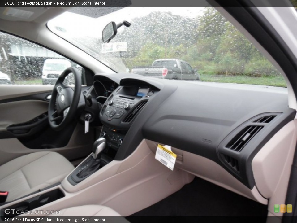 Medium Light Stone Interior Dashboard for the 2016 Ford Focus SE Sedan #107517998