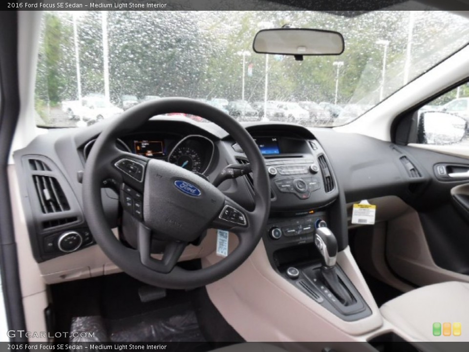 Medium Light Stone Interior Prime Interior for the 2016 Ford Focus SE Sedan #107518241