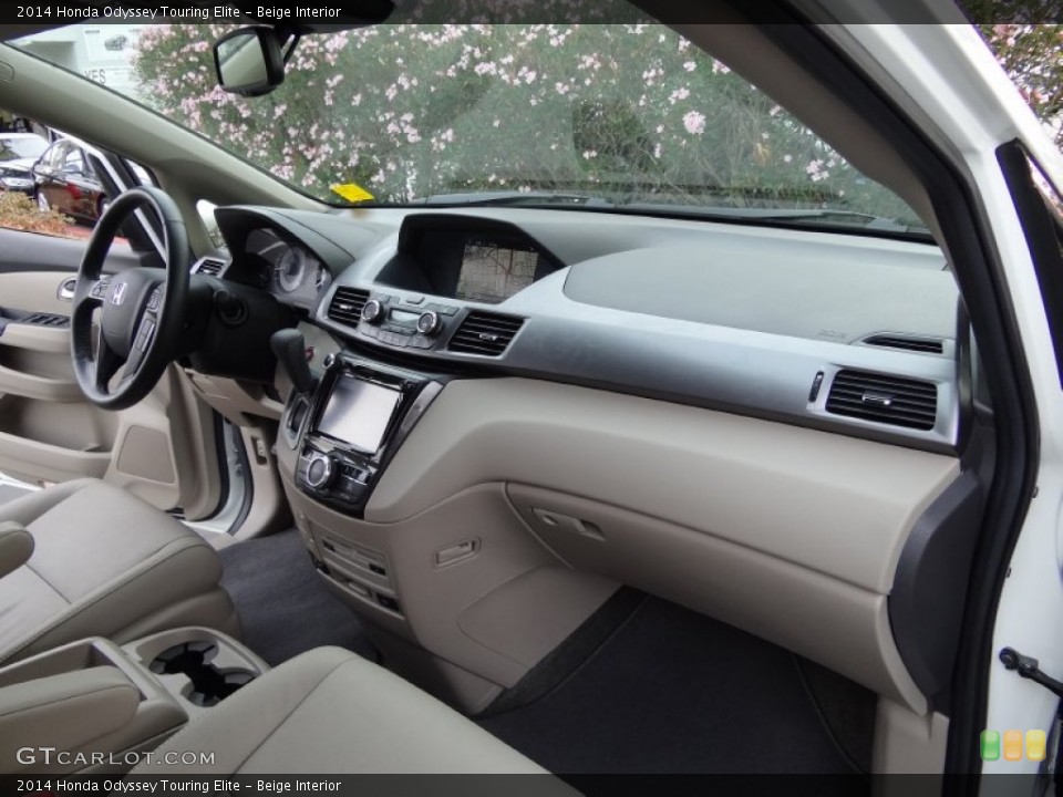 Beige Interior Dashboard for the 2014 Honda Odyssey Touring Elite #107518381