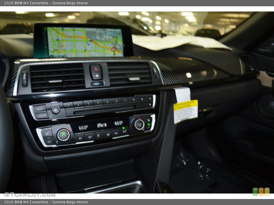 Sonoma Beige Interior Controls for the 2016 BMW M4 Convertible #107518816
