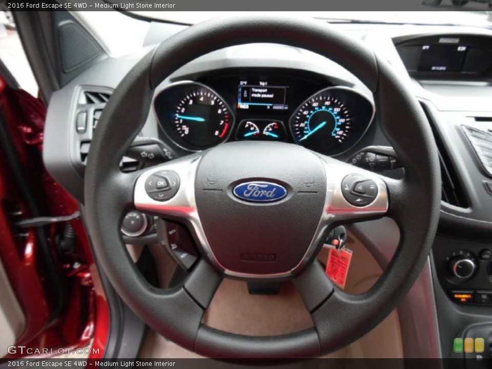 Medium Light Stone Interior Steering Wheel for the 2016 Ford Escape SE 4WD #107631073