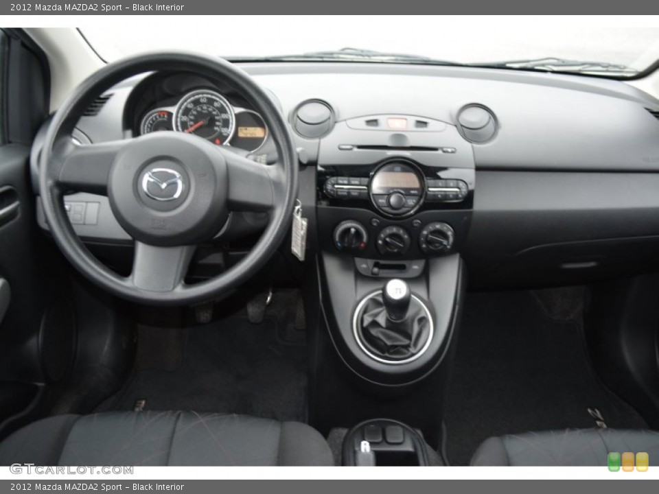 Black Interior Dashboard for the 2012 Mazda MAZDA2 Sport #107674066