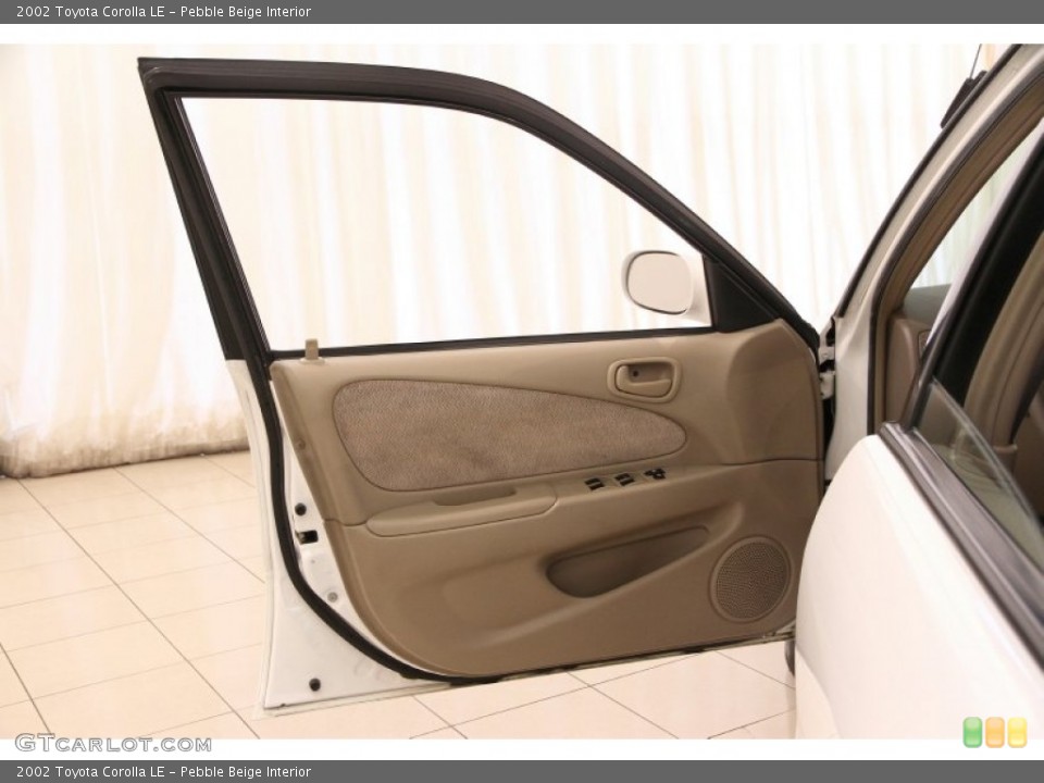 Pebble Beige Interior Door Panel for the 2002 Toyota Corolla LE #107745065