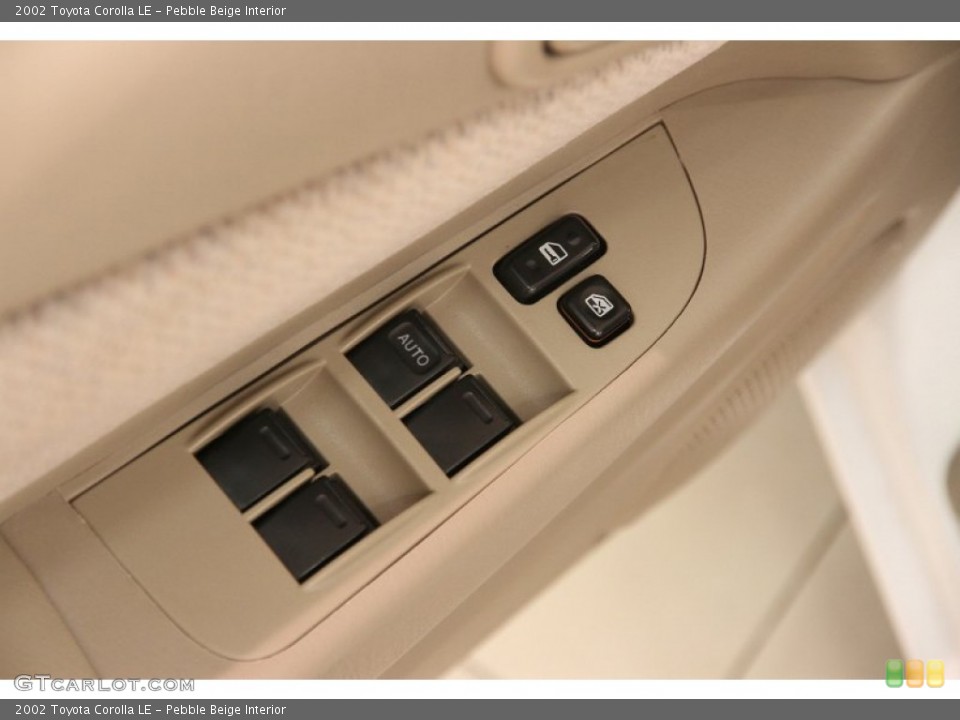 Pebble Beige Interior Controls for the 2002 Toyota Corolla LE #107745083