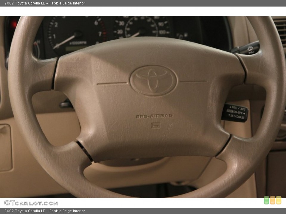 Pebble Beige Interior Steering Wheel for the 2002 Toyota Corolla LE #107745160