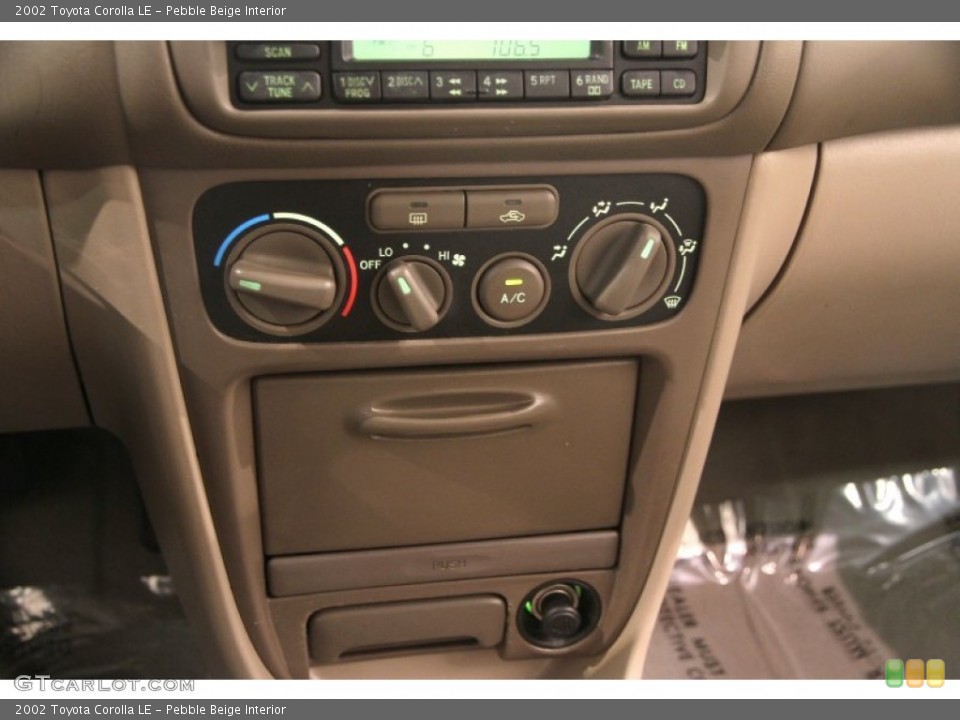 Pebble Beige Interior Controls for the 2002 Toyota Corolla LE #107745212