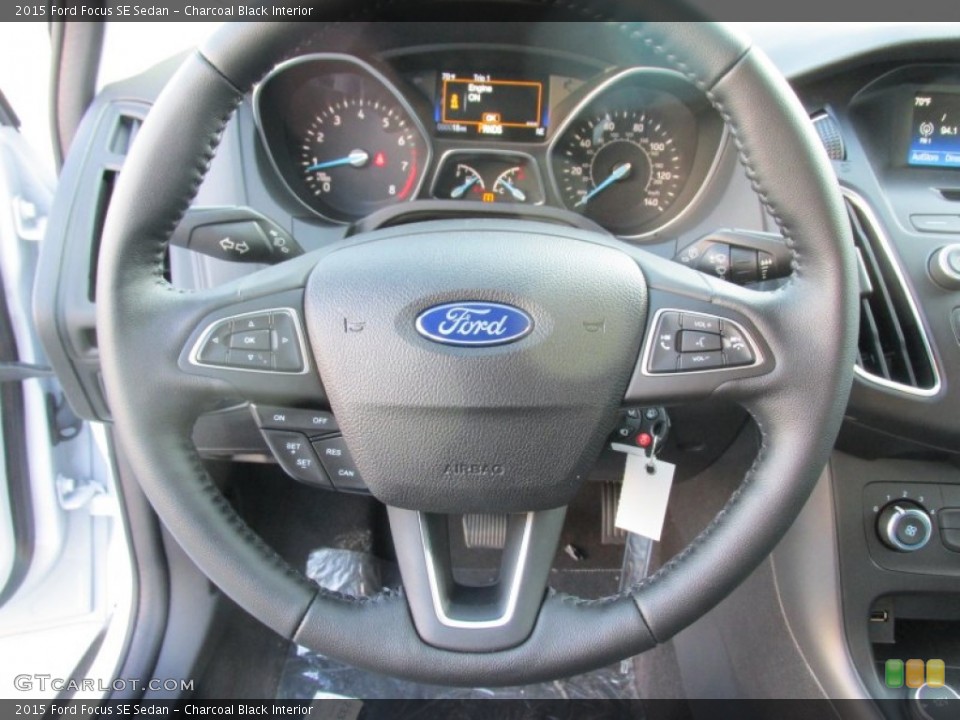 Charcoal Black Interior Steering Wheel for the 2015 Ford Focus SE Sedan #107754603