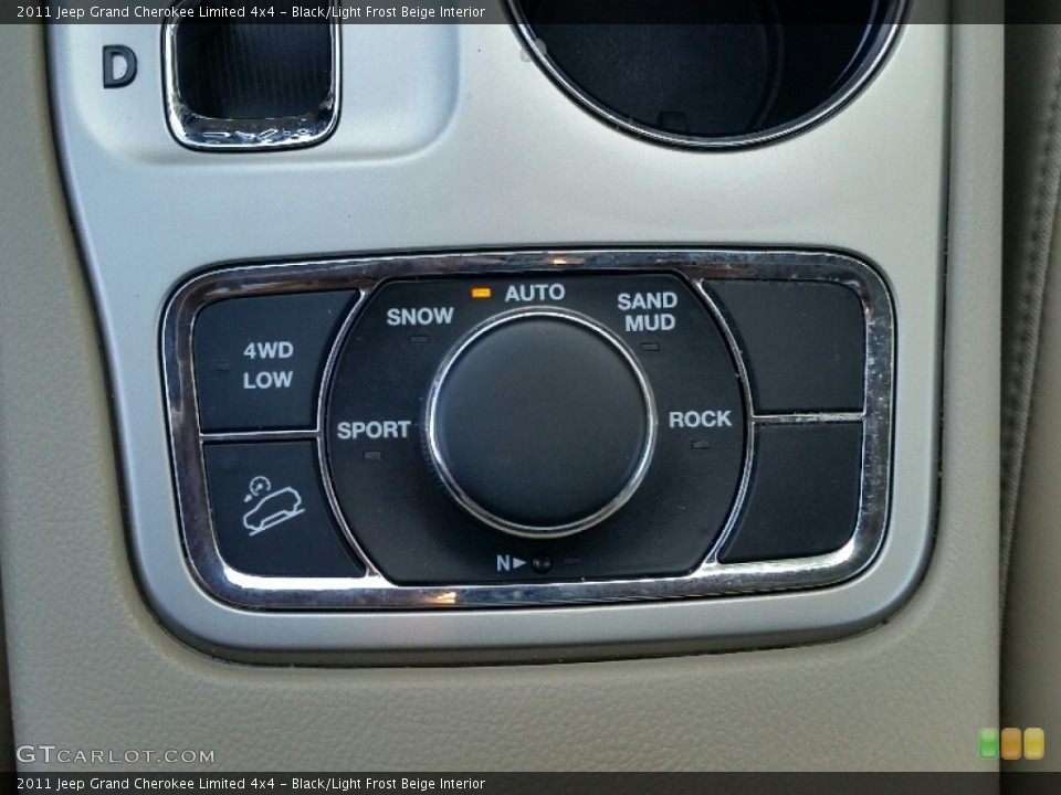 Black/Light Frost Beige Interior Controls for the 2011 Jeep Grand Cherokee Limited 4x4 #107864352