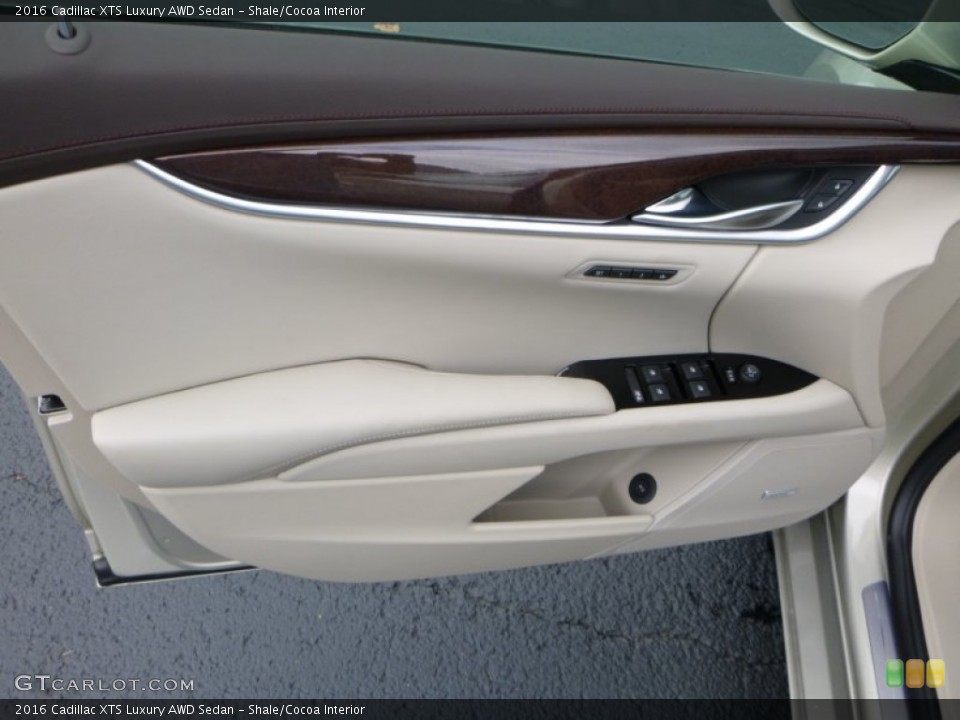 Shale/Cocoa Interior Door Panel for the 2016 Cadillac XTS Luxury AWD Sedan #107899305