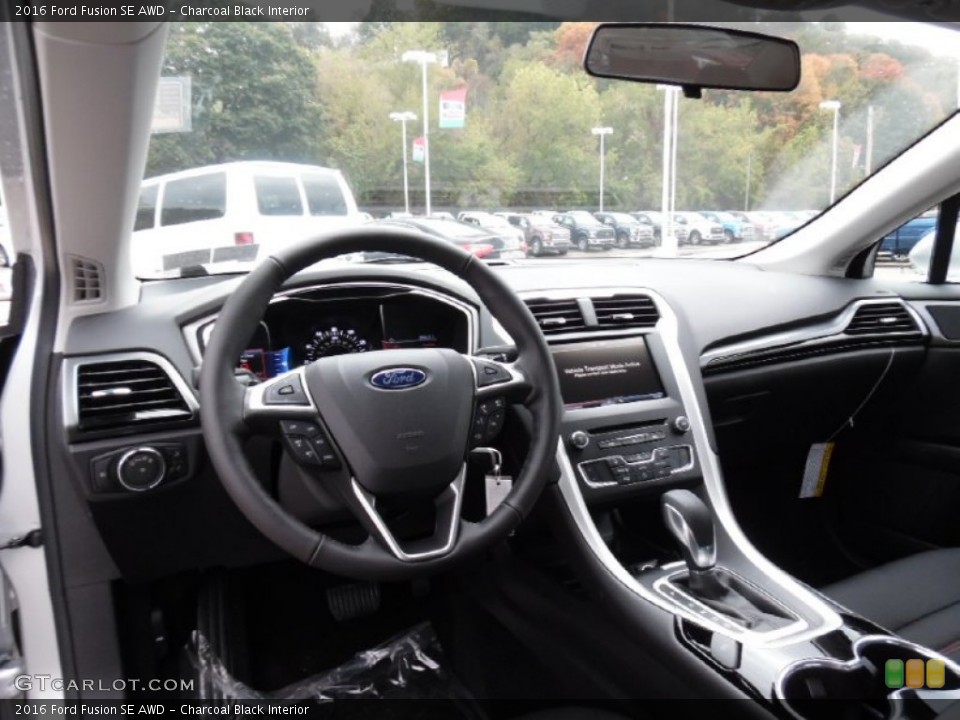 Charcoal Black Interior Dashboard for the 2016 Ford Fusion SE AWD #107912586