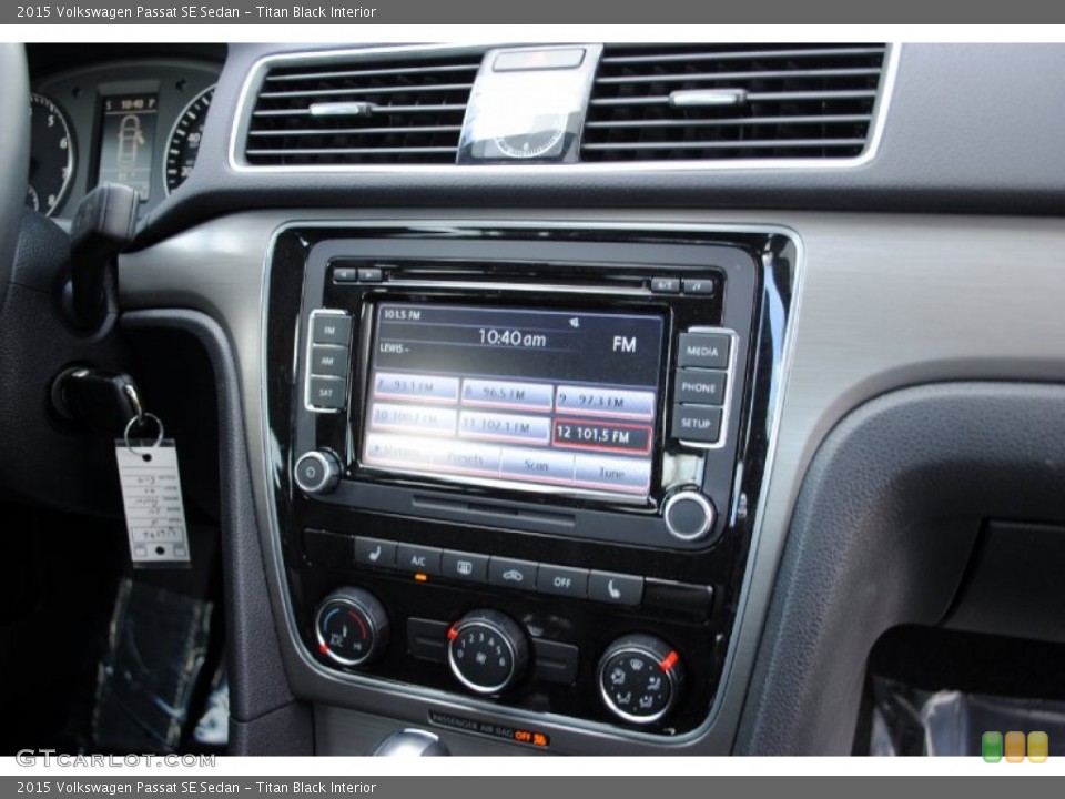 Titan Black Interior Controls for the 2015 Volkswagen Passat SE Sedan #108184501