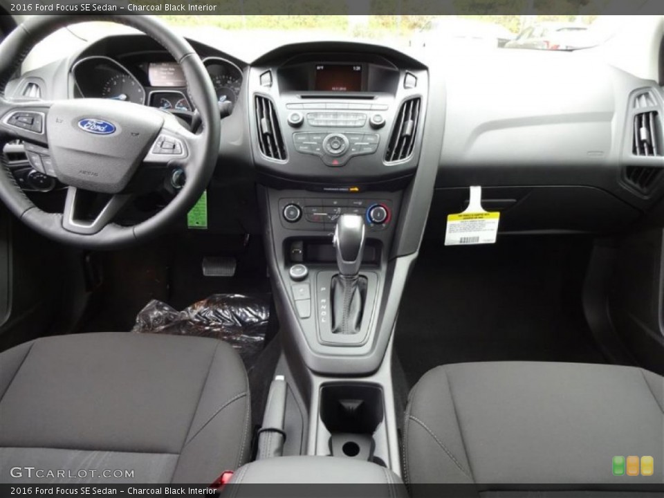 Charcoal Black Interior Dashboard for the 2016 Ford Focus SE Sedan #108204058