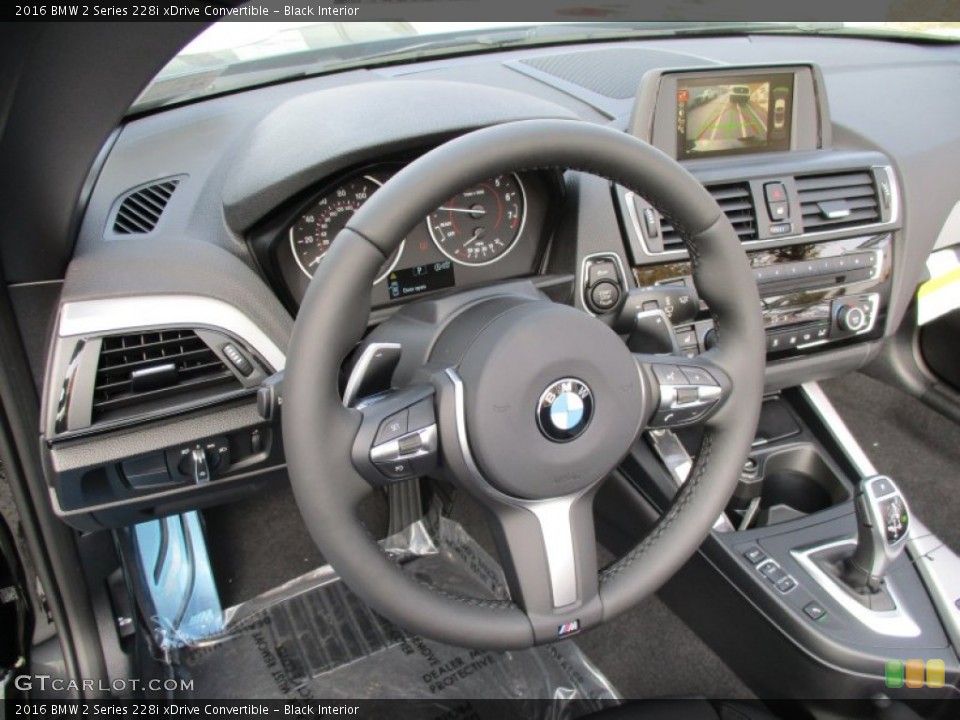 Black Interior Steering Wheel for the 2016 BMW 2 Series 228i xDrive Convertible #108237358
