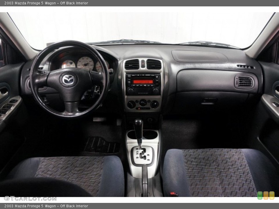 Off Black Interior Dashboard for the 2003 Mazda Protege 5 Wagon #108246024