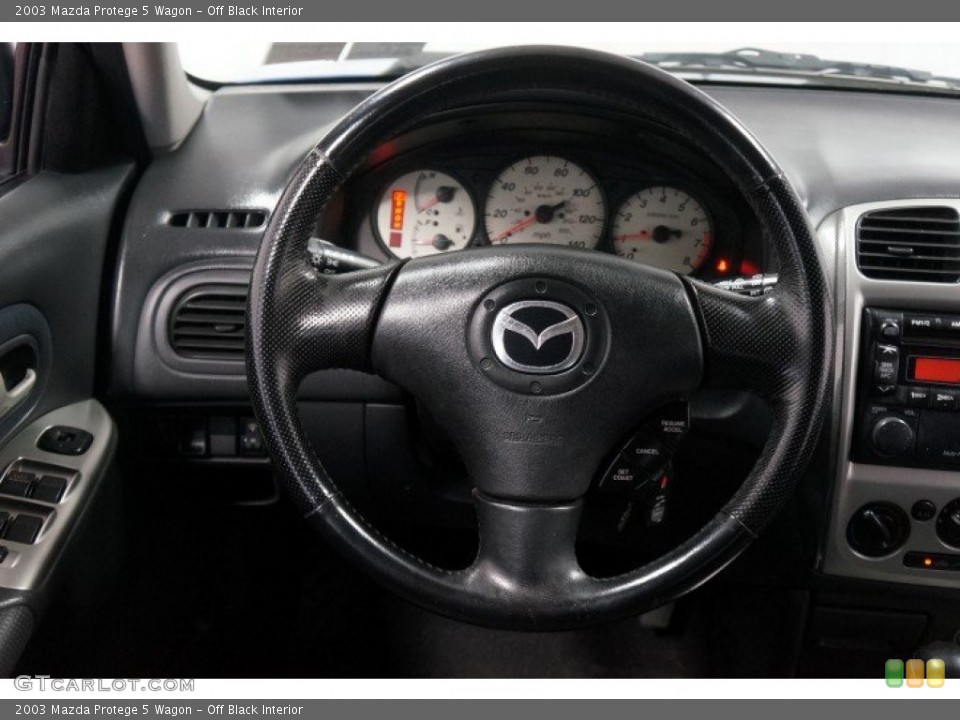 Off Black Interior Steering Wheel for the 2003 Mazda Protege 5 Wagon #108246054