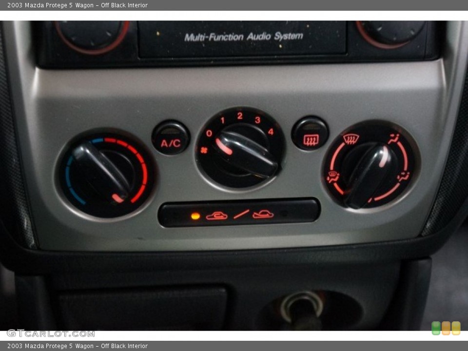 Off Black Interior Controls for the 2003 Mazda Protege 5 Wagon #108246237