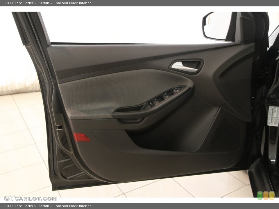 Charcoal Black Interior Door Panel for the 2014 Ford Focus SE Sedan #108507899