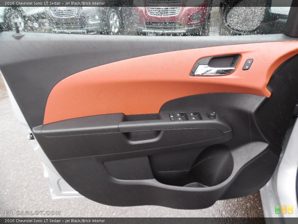 Jet Black/Brick Interior Door Panel for the 2016 Chevrolet Sonic LT Sedan #108528668