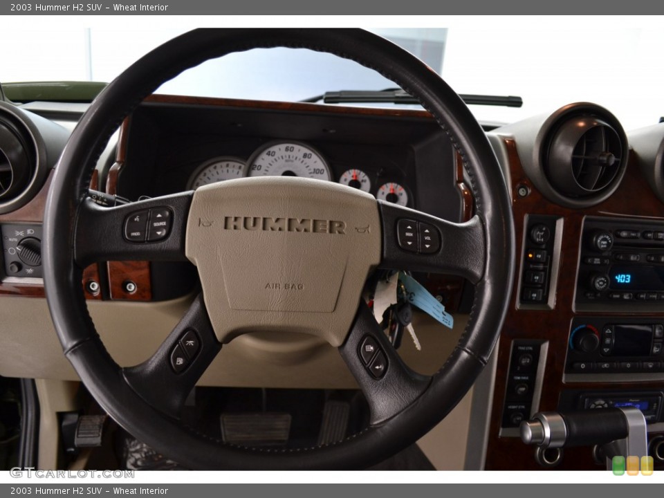Wheat Interior Steering Wheel for the 2003 Hummer H2 SUV #108674779