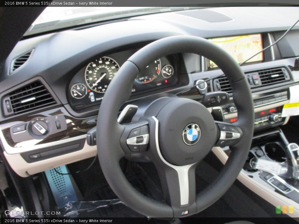 Ivory White Interior Steering Wheel for the 2016 BMW 5 Series 535i xDrive Sedan #108801120