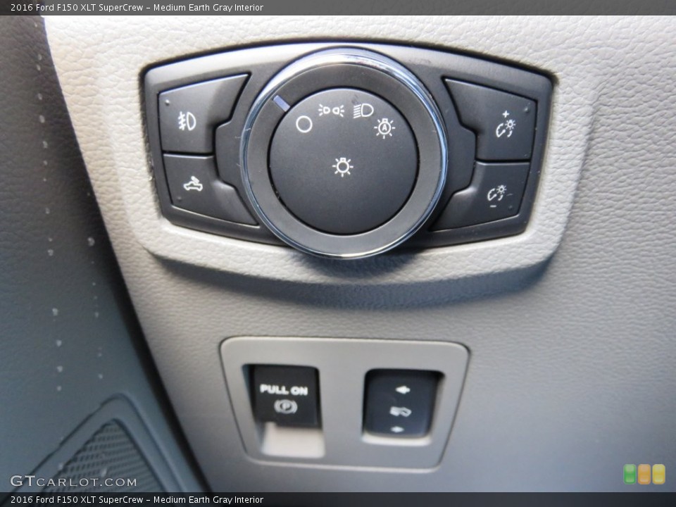 Medium Earth Gray Interior Controls for the 2016 Ford F150 XLT SuperCrew #108947526