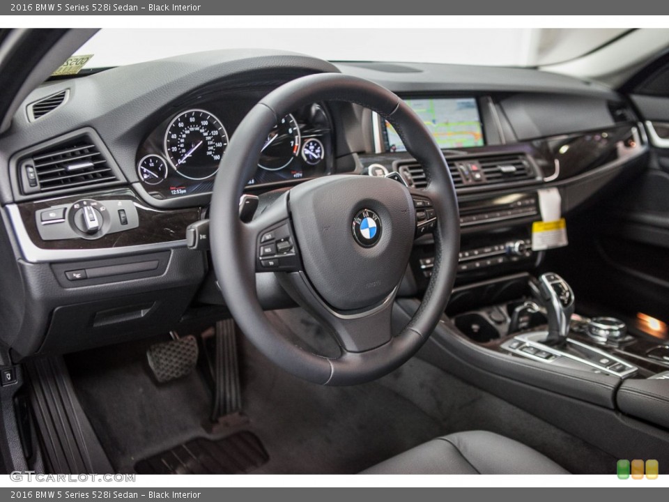 Black Interior Dashboard for the 2016 BMW 5 Series 528i Sedan #109300639