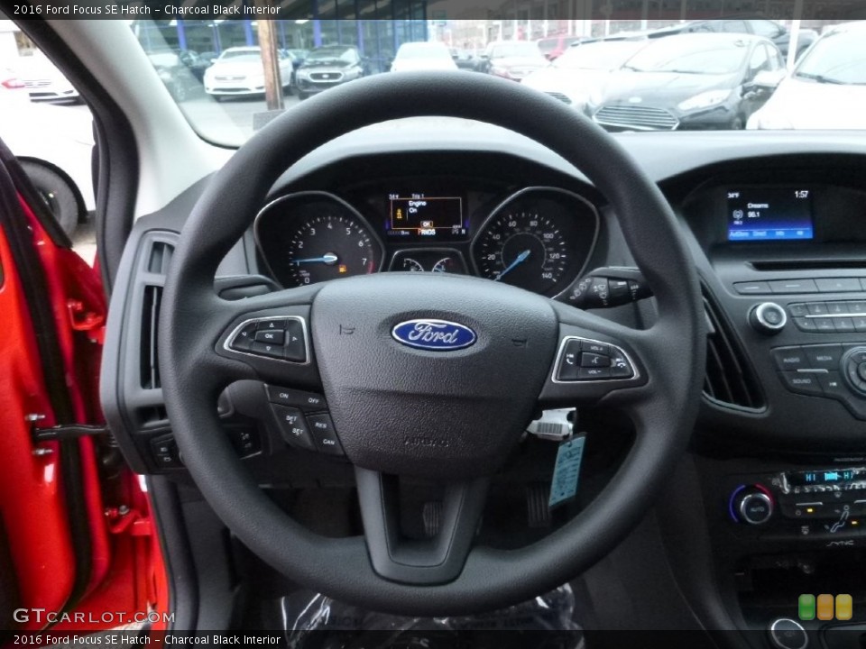Charcoal Black Interior Steering Wheel for the 2016 Ford Focus SE Hatch #109536813