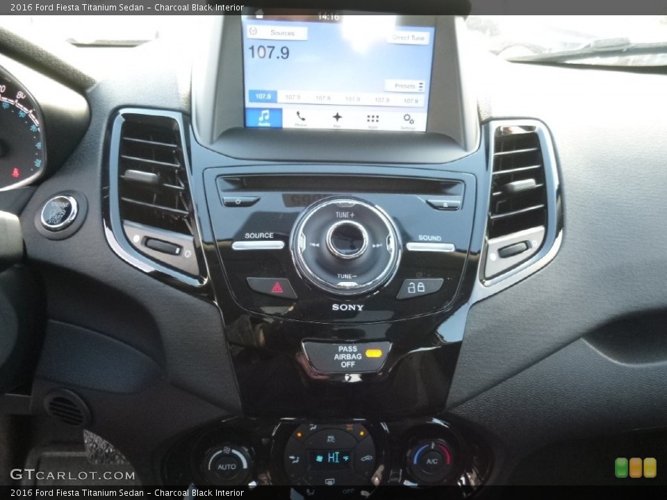 Charcoal Black Interior Controls for the 2016 Ford Fiesta Titanium Sedan #109799676